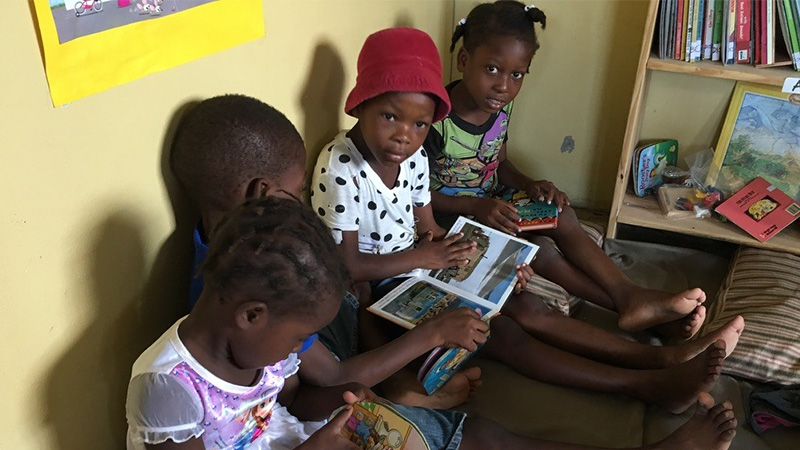 Children reading inside Haitian library