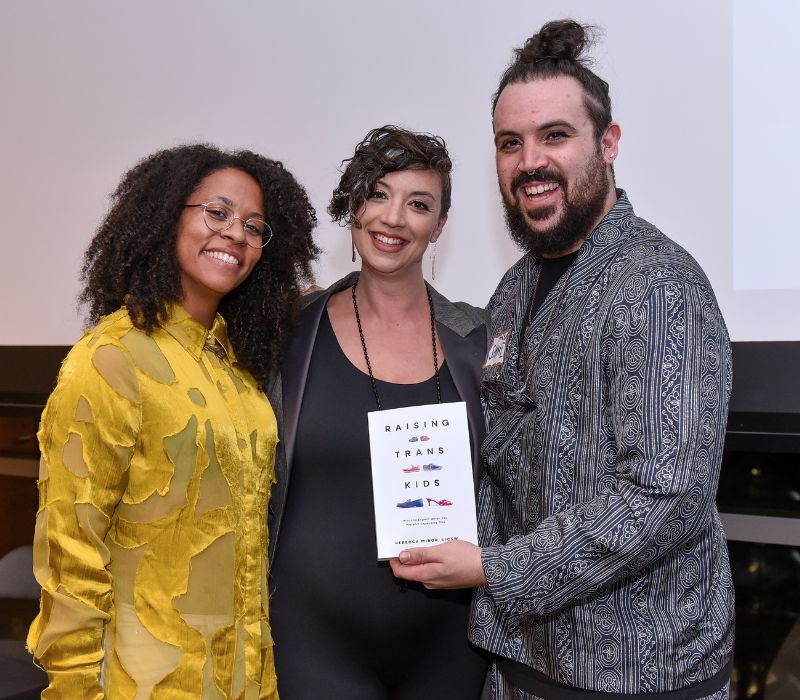 A group poses for a photo at at an Equality Fund event