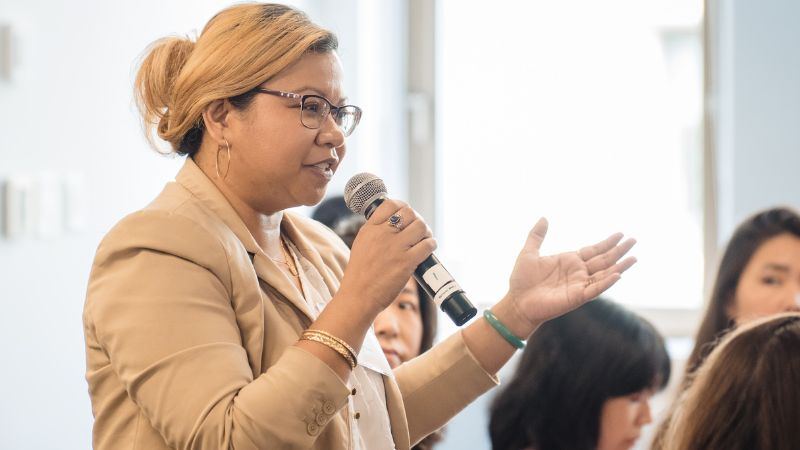 An audience member asks a question at the Making Waves report release event in June 2025