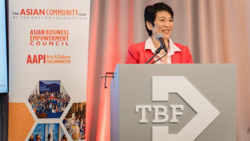 A speaker gives remarks onstage at the Making Waves report release event in June 2025