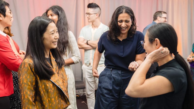 Guests and panelists talk and laugh at the Making Waves report release event in June 2025
