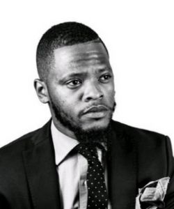 James Mackey headshot, black and white