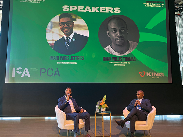 Imari Paris Jeffries and Hank Willis Thomas sit onstage for a session during Embrace Ideas Festival