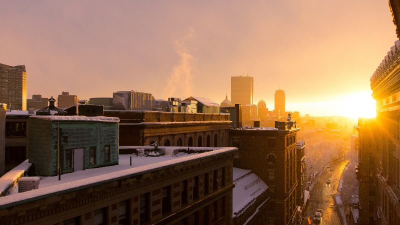 A sunrise over Boston in the winter