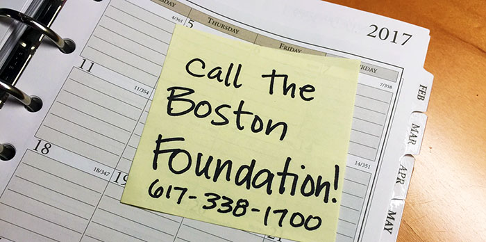 calendar with sticky note: Call TBF